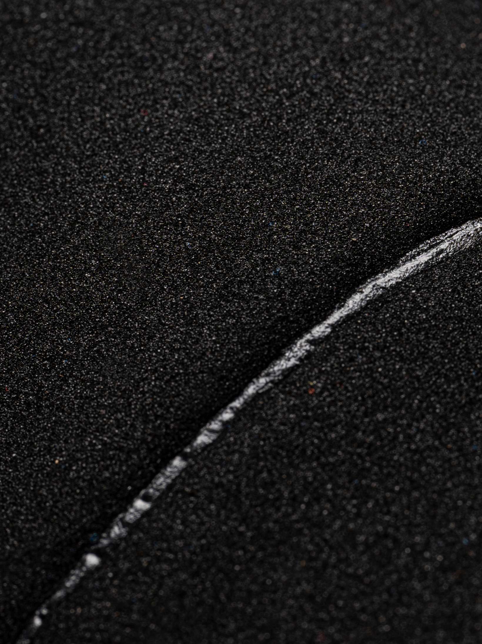 An image showing the quality of the gluing on the open cell wetsuit interior