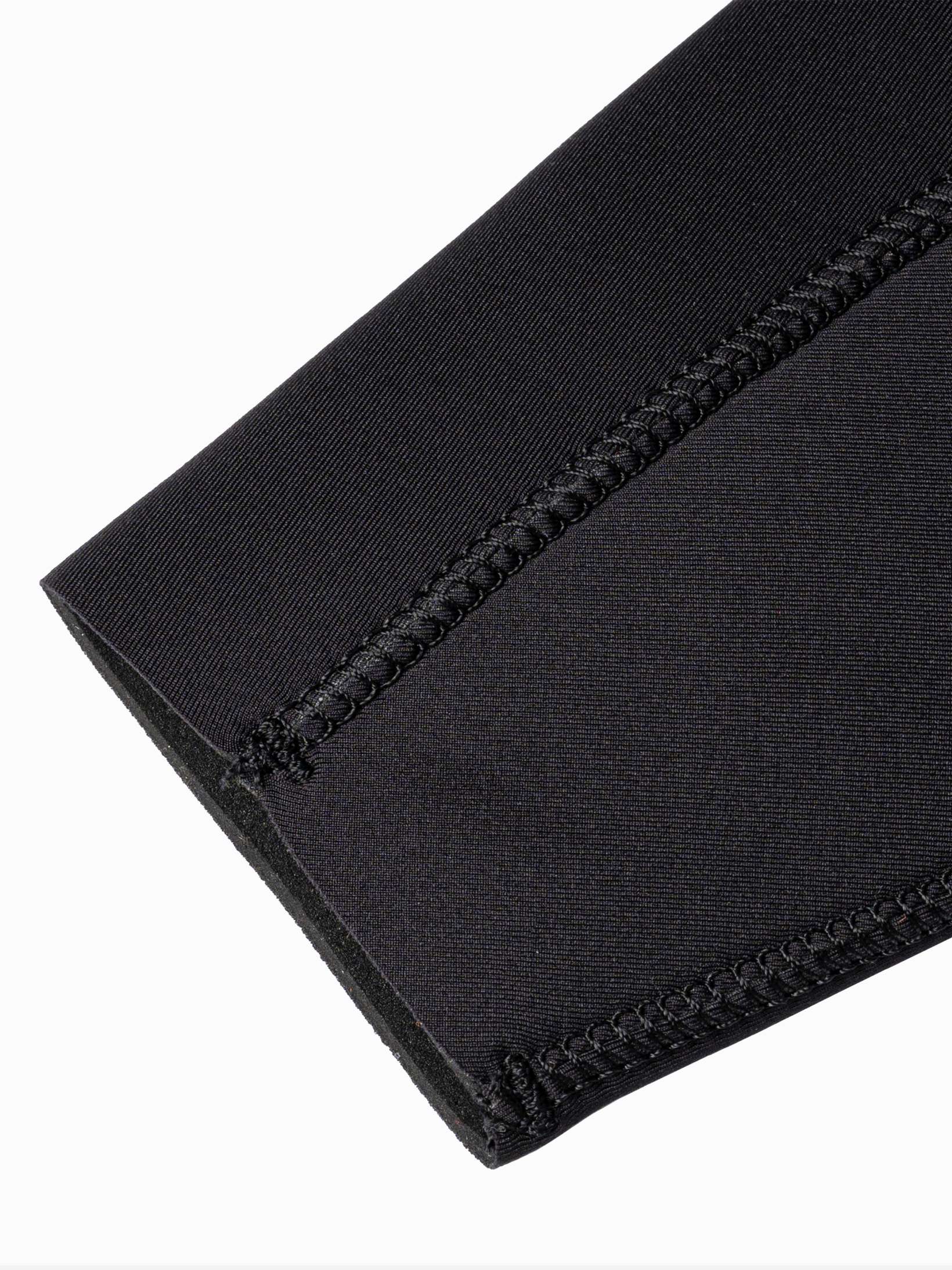 Close up of the external stretchy lining and quality stitching on the womens open cell wetsuit