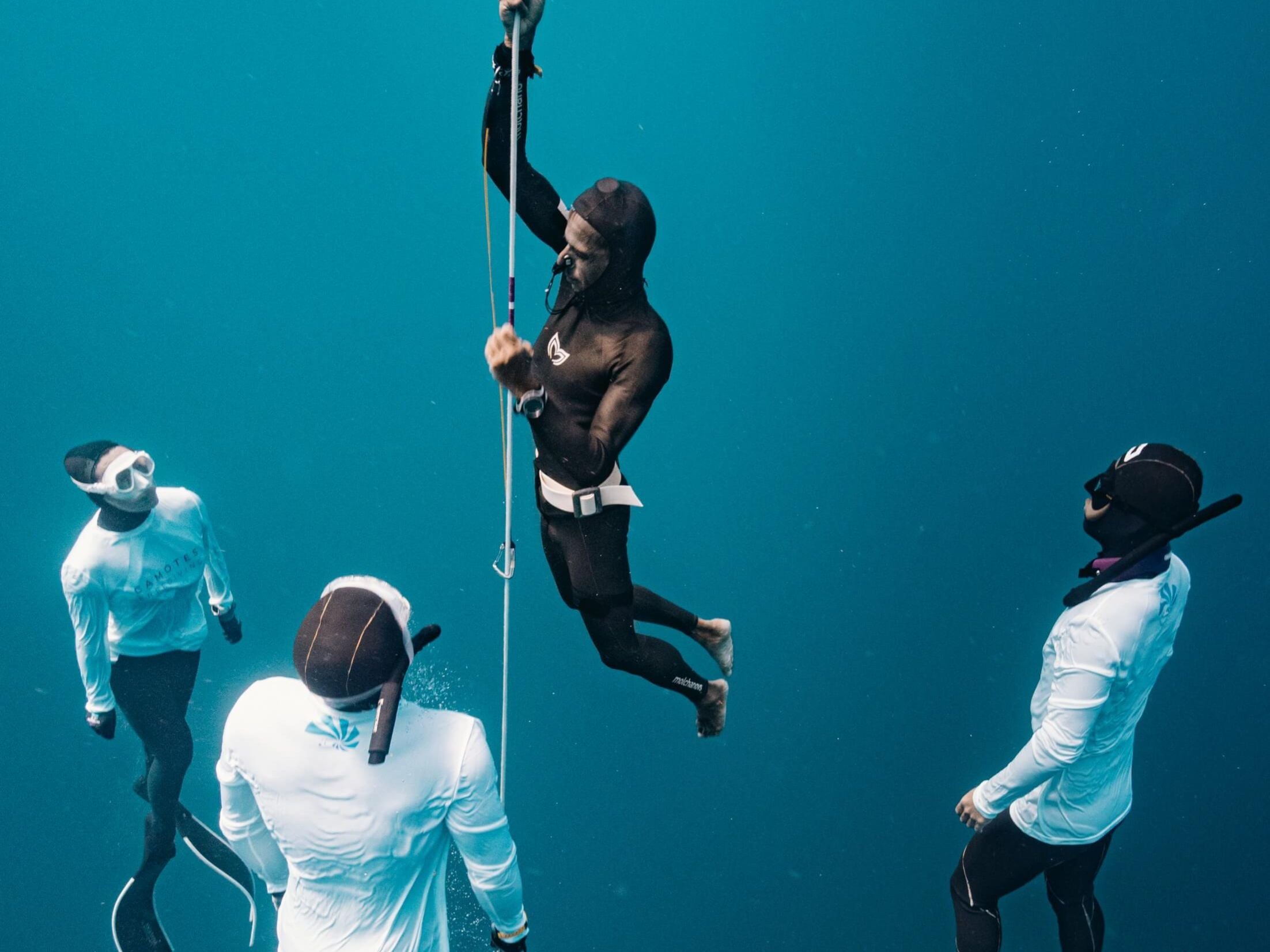 Balancing Competing and Organizing in Freediving Competitions