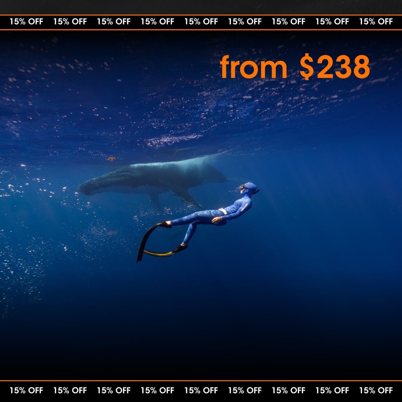 Female freediver wearing a womens cut fredddiving wetsuit while exploring a reef