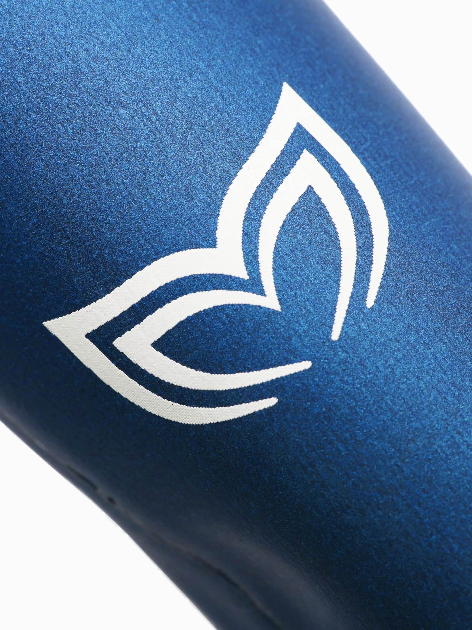 Molchanovs logo in white, on a blue smooth skin performance wetsuit